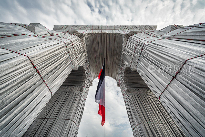 Arc de Triomphe Wrapped by Christo with hanging French Flag Paris France
